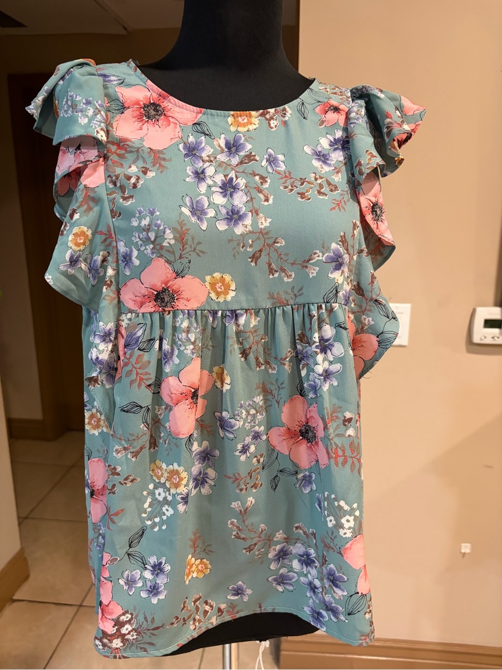 Andree by Unit blue floral blouse.
